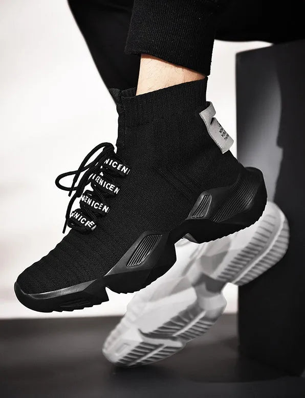 Men's black and white casual sports shoes with mesh lining, shown in large sizes