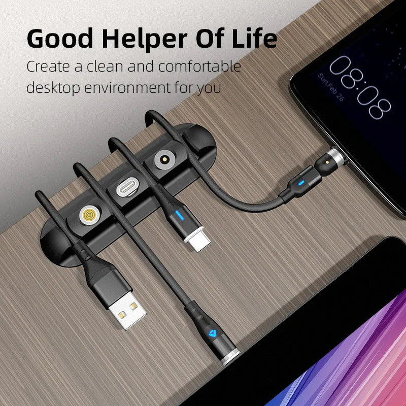 Black soft plastic desktop charging cable organiser with magnetic data cable management system