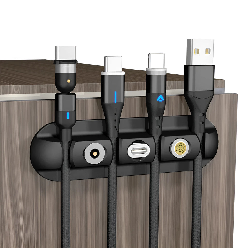Black soft plastic desktop charging cable organiser with magnetic data cable management system