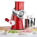 Blue multifunction vegetable chopper kitchen gadget with suction cup base on a countertop.