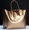 Women's cowhide leather handbag with detachable shoulder strap in bronze colour