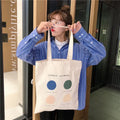 Women's geometric pattern canvas tote shopper bag with cotton lining and shoulder straps