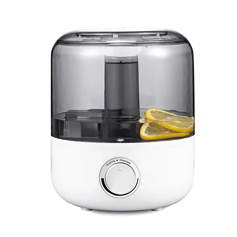White mechanical humidifier with water tank and control dial on a wooden surface.