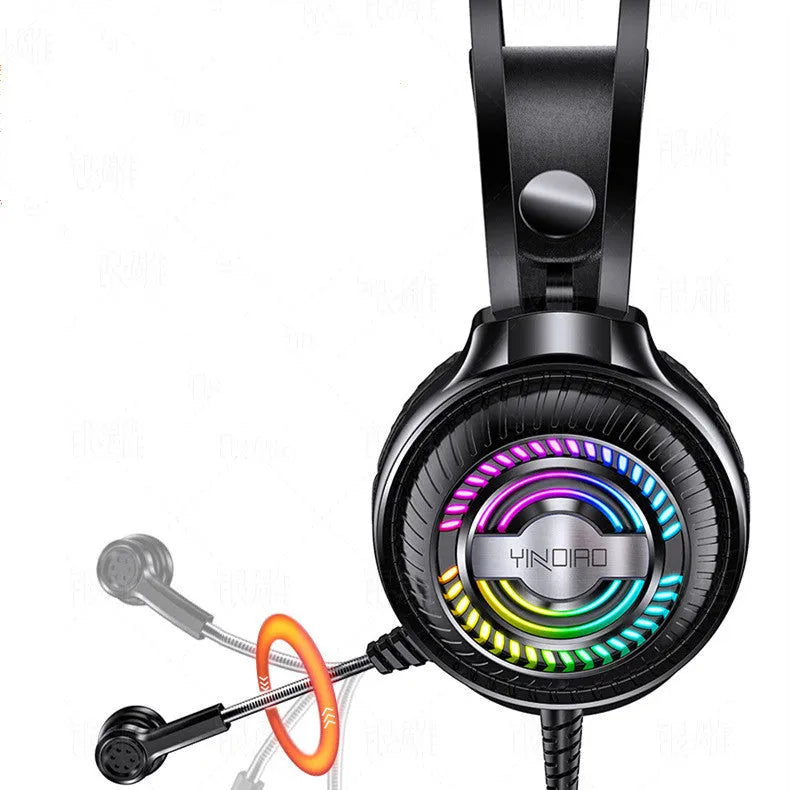 Black and white wired over-ear PC headset with microphone and long cable.