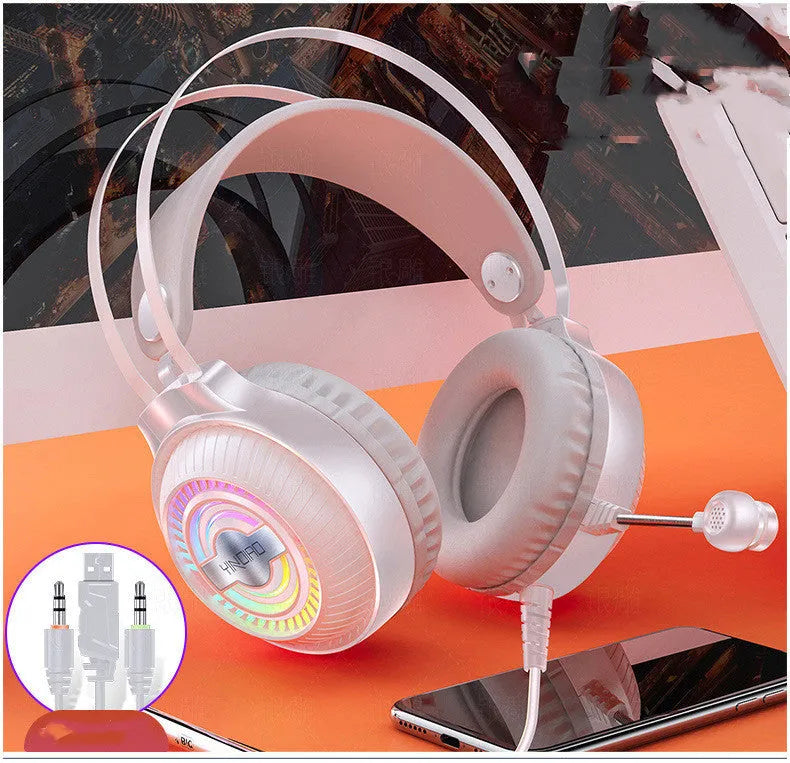 Black and white wired over-ear PC headset with microphone and long cable.