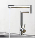 Silver stainless steel kitchen faucet with dual handles and 360-degree rotating spout