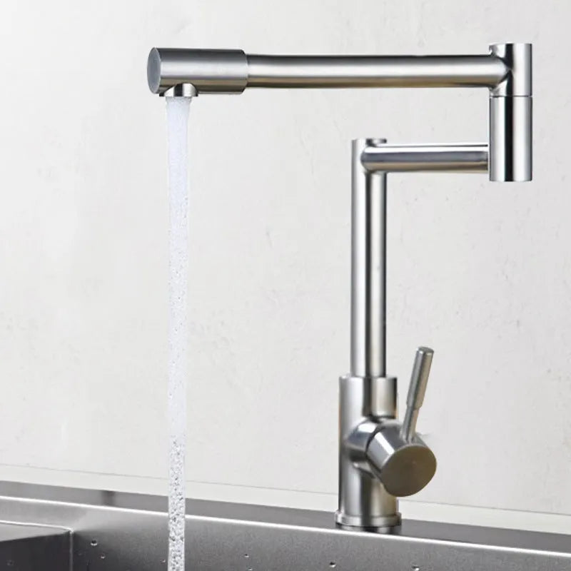 Silver stainless steel kitchen faucet with dual handles and 360-degree rotating spout