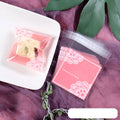 Pink self-adhesive plastic packaging bags for handmade soap, shown in a pack.