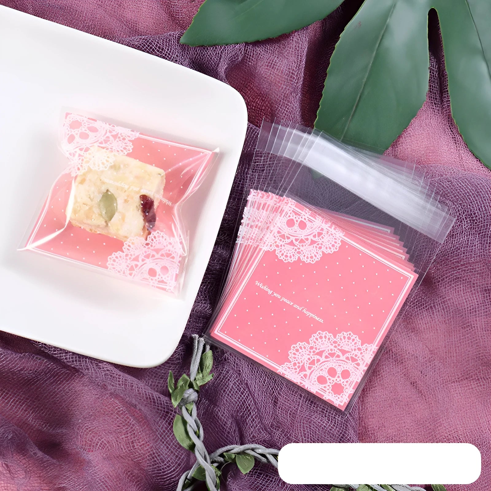 Pink self-adhesive plastic packaging bags for handmade soap, shown in a pack.