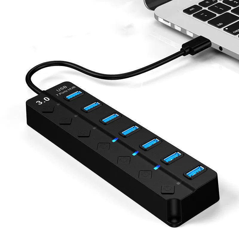 Black 7-port USB 3.0 hub with external power supply adapter for PC and laptop expansion