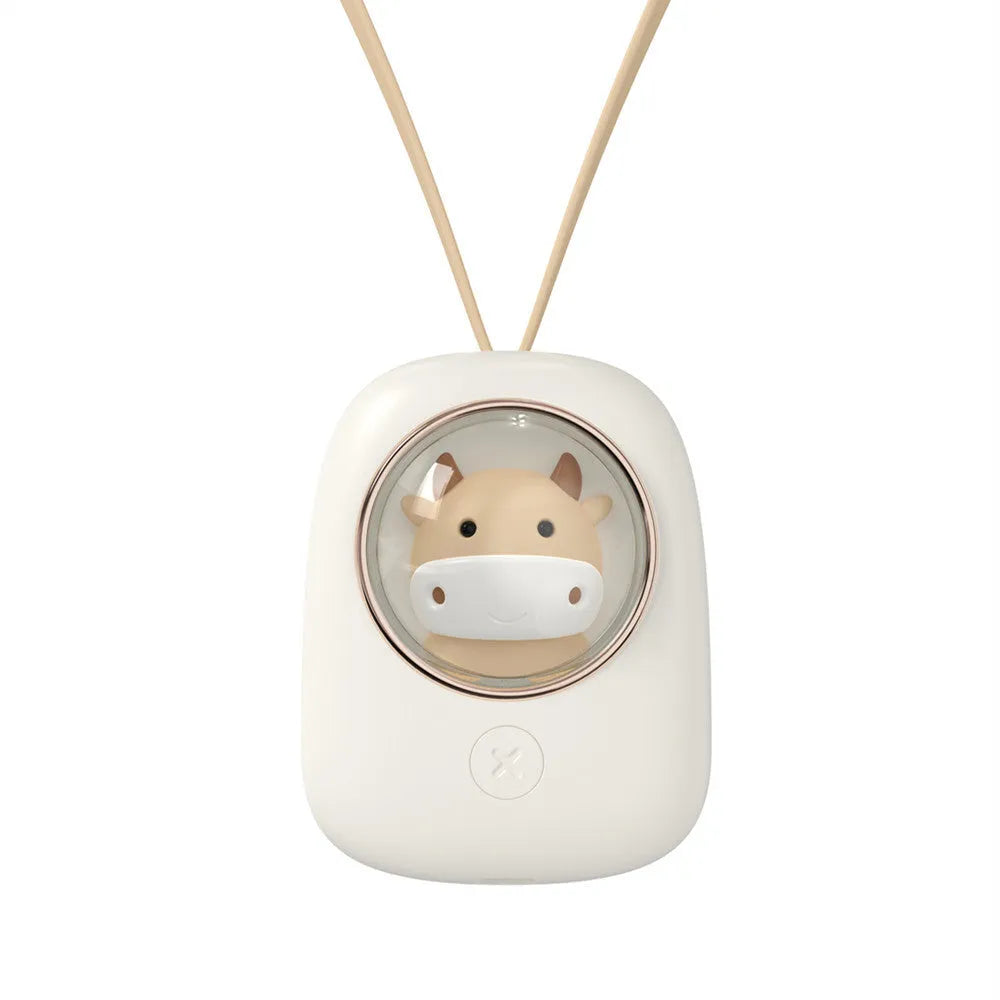 White handheld hanging neck fan with USB port and three speed buttons on a table.