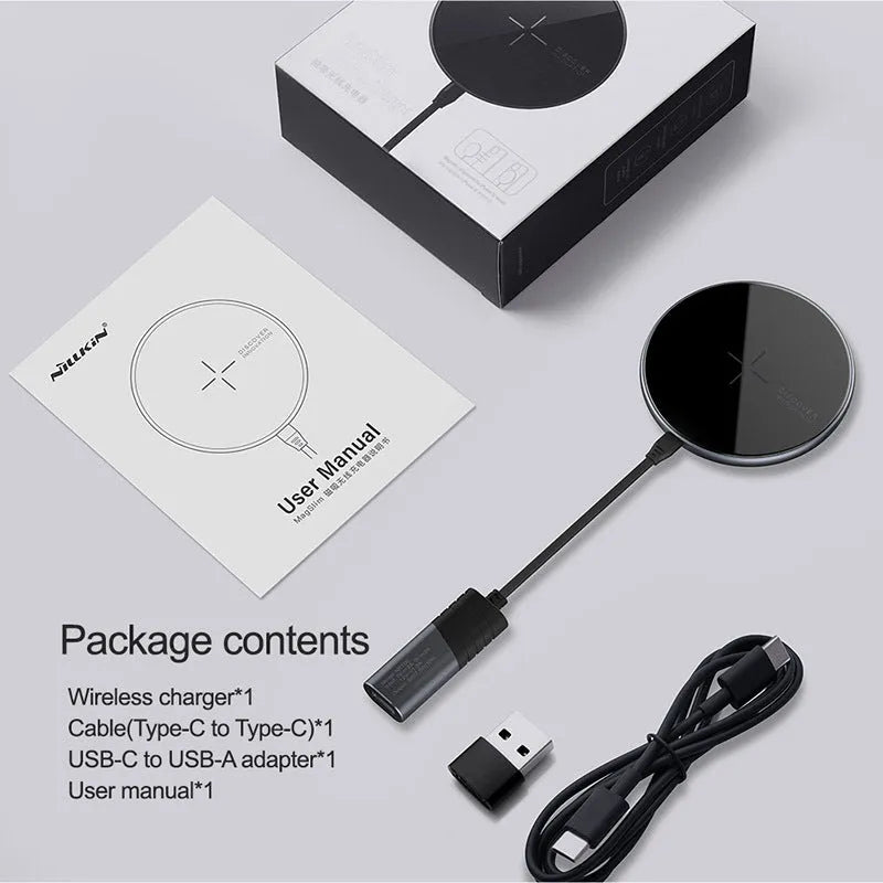 Black MagSlim magnetic wireless charger for mobile phones on a flat surface
