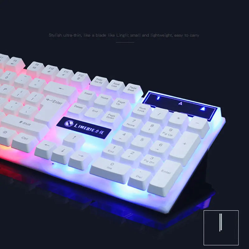 GTX300 black wired gaming keyboard and mouse set with colour backlit keys on desk