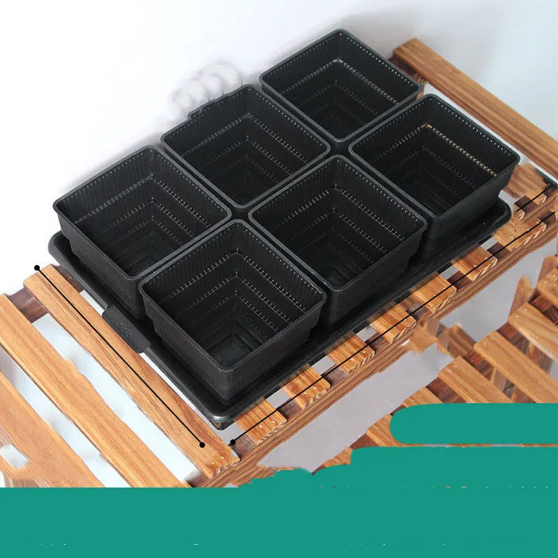 Meishi black and white resin succulent flower pot with multiple basins on a 32cm diameter tray