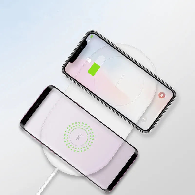 White dual wireless charging pad for two mobile phones with minimalist design