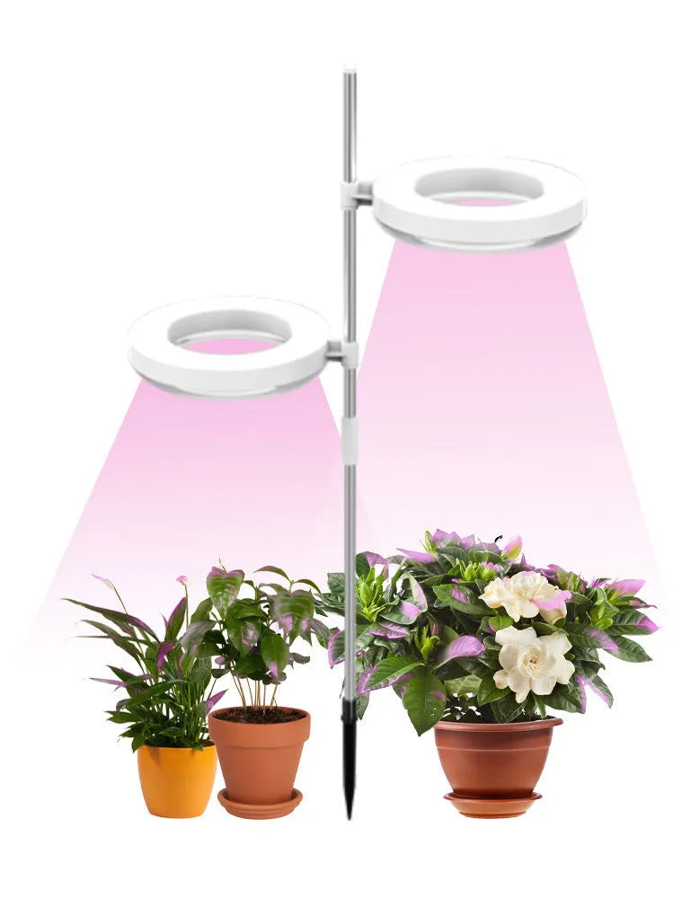 Compact full spectrum plant growth lamp for home office desk with PC shell.