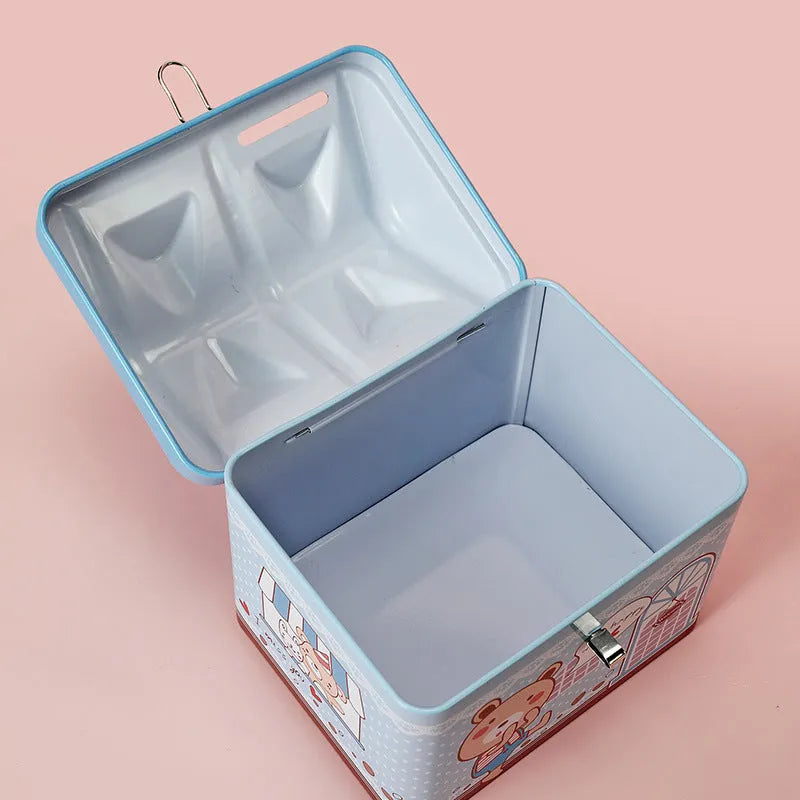 Blue house-shaped tinplate piggy bank with coin slot on lid for desktop coin storage
