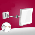 Stainless steel folding bathroom makeup mirror with integrated LED light in silver finish