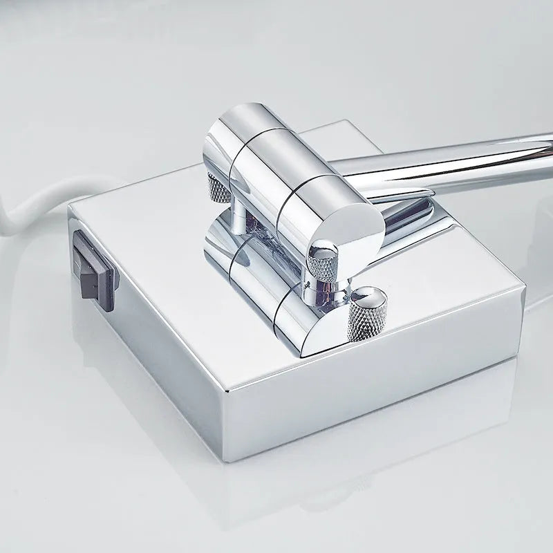Stainless steel folding bathroom makeup mirror with integrated LED light in silver finish