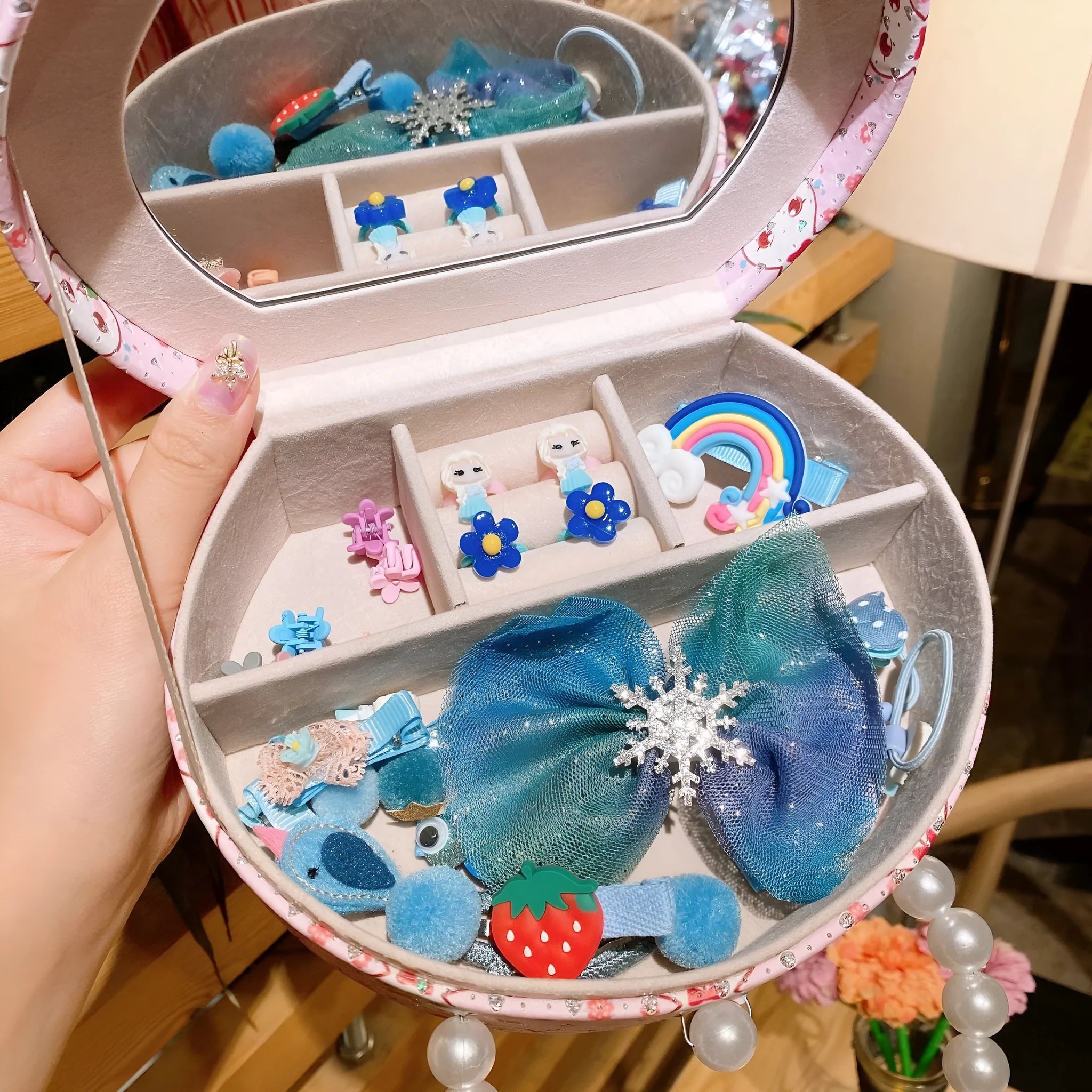 Children's princess hair clip jewellery set with 26 pieces in gift box showing cartoon character designs