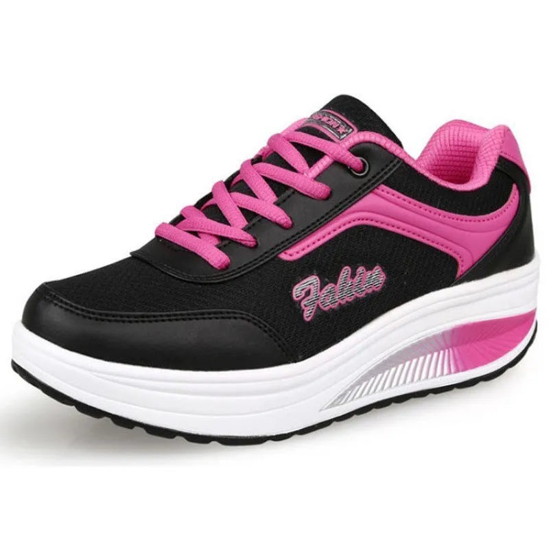 Women's mid-heel travel sports shoes in black colour with heelless design