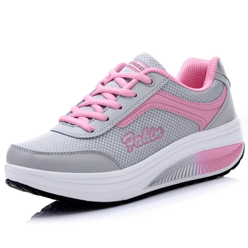 Women's mid-heel travel sports shoes in black colour with heelless design