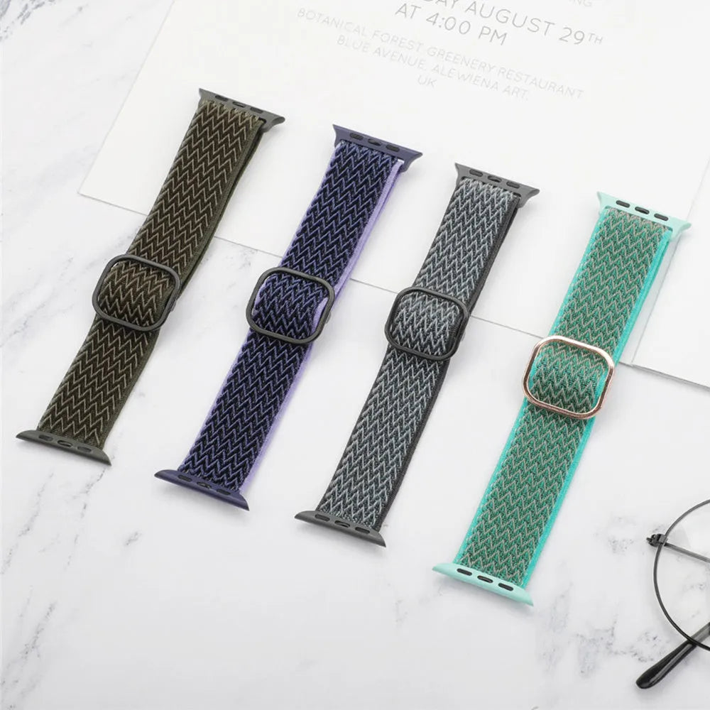 Braided nylon wave-pattern strap for Apple Watch in multiple colour options on a grey background.