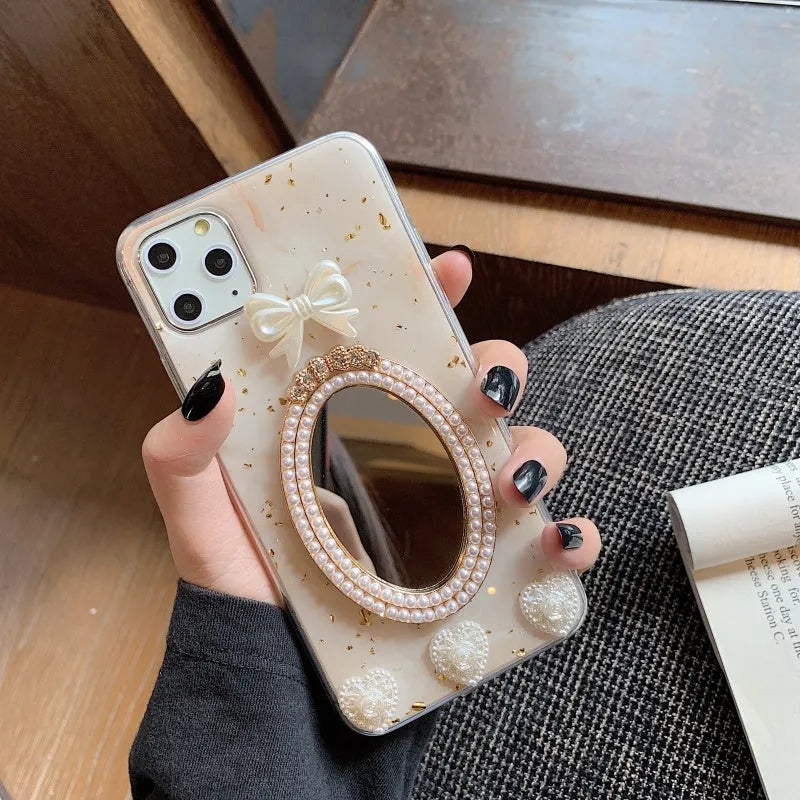Brown silicone iPhone case with marble bowknot design and rhinestone mirror