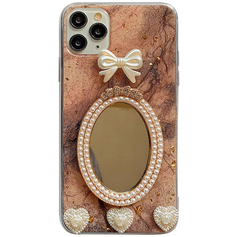 Brown silicone iPhone case with marble bowknot design and rhinestone mirror