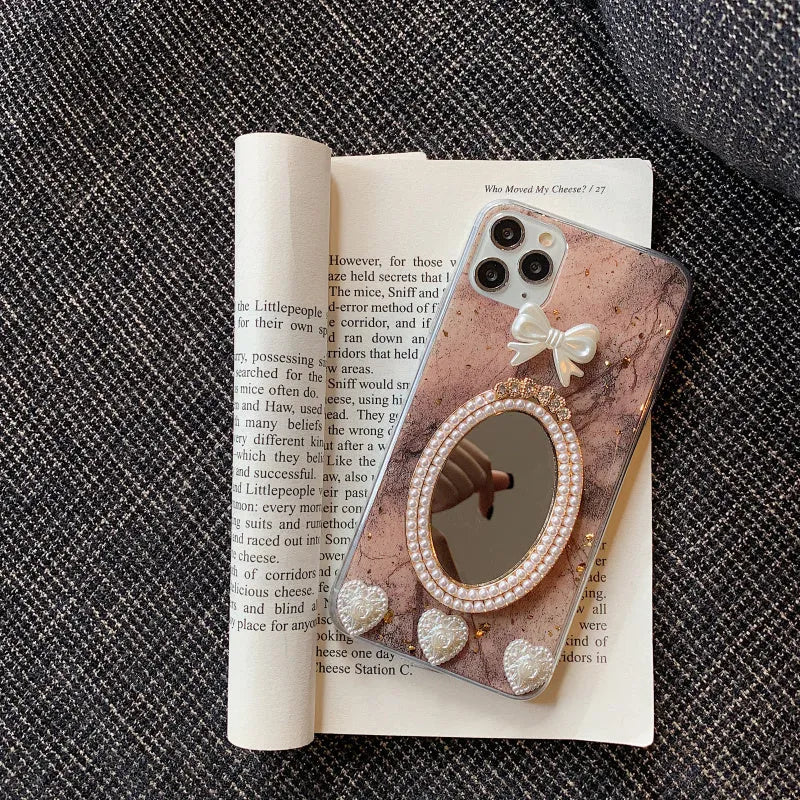 Brown silicone iPhone case with marble bowknot design and rhinestone mirror