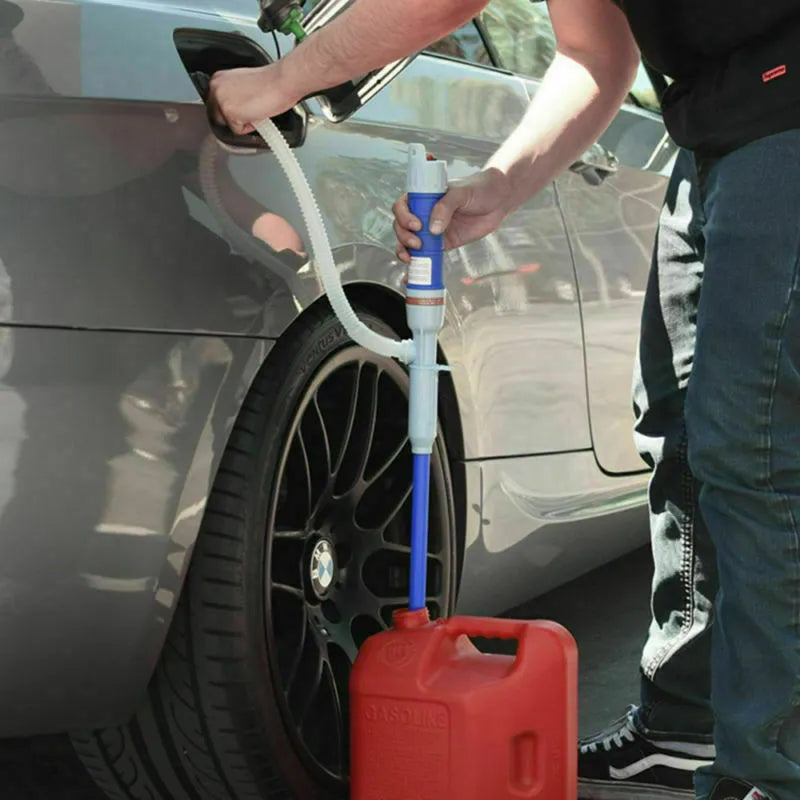 Blue manual hand pump with pipe for transferring fuel, oil or water.