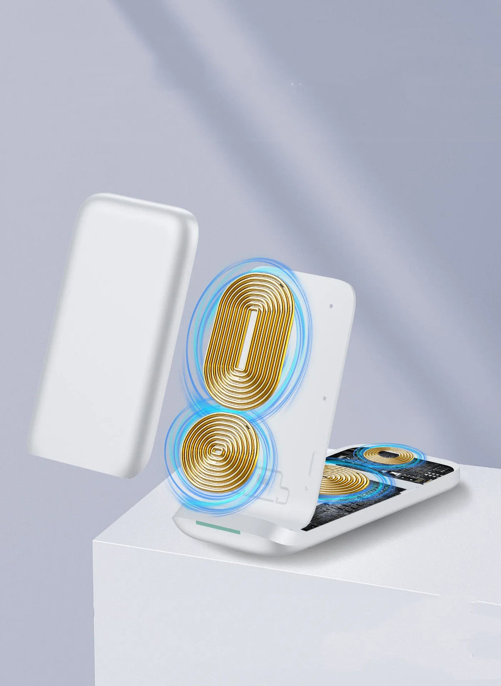 Black foldable three-in-one wireless charger shown open and closed next to a smartphone