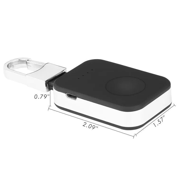 Black Apple Watch portable wireless power bank with keychain ring, shown next to an Apple Watch.