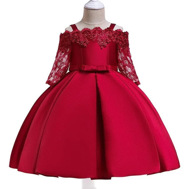 Girls red lace-trimmed dress with ruffle sleeves on a hanger