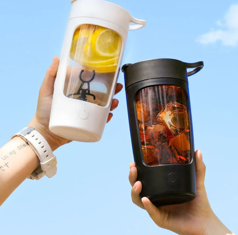 Portable juice blender with 650ml capacity in black blue pink or white featuring automatic mixing motor
