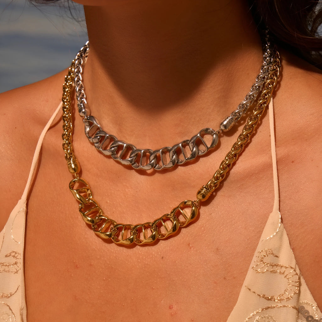 Gold plated stainless steel necklace with geometric pendant on regular chain