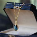 Gold electroplated geometry pendant necklace on adjustable chain with French retro design