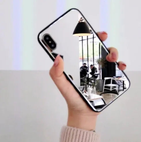 Black iPhone back cover case with a reflective mirror surface on the back, compatible with iPhone 7 Plus, 8 Plus, and X models.