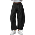 Women's loose cropped sweatpants with drawstring waist and side pockets in street fashion style