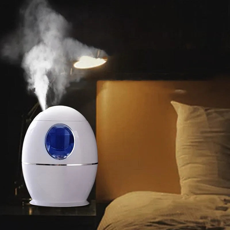 White columnar household air disinfection humidifier with USB cable on a table