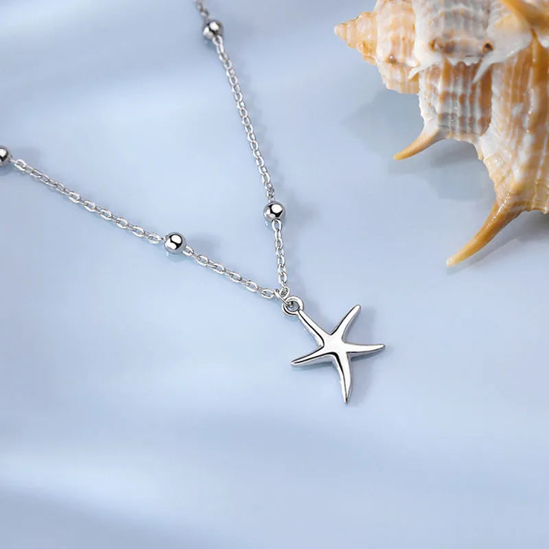 S925 sterling silver women's anklet with starfish charm and round beads on adjustable chain