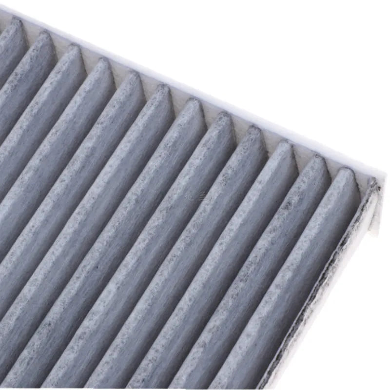 Grey Geely vehicle cabin air filter grid panel measuring 215x210x30mm