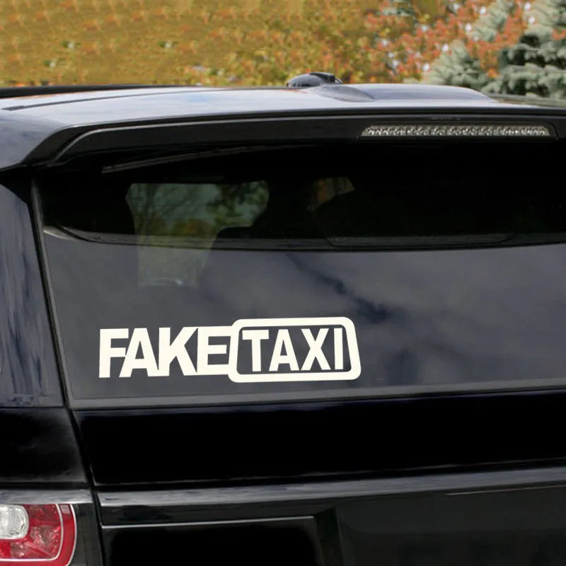 FAKE TAXI text on a 20cm by 8cm yellow, black, and white waterproof PET car sticker.