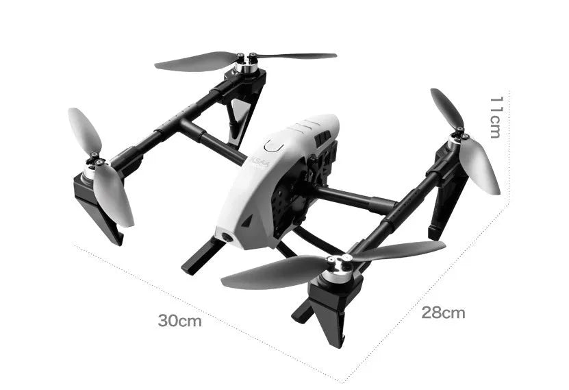 White KS66 alloy UAV drone with camera and remote control on a grassy outdoor field.