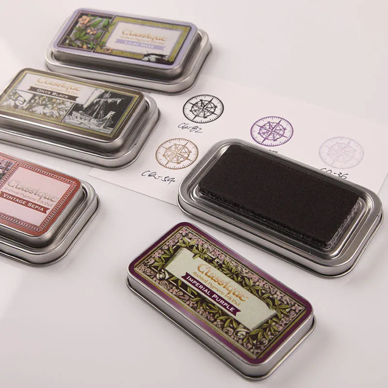 Rectangular oily ink pad for rubber stamps in five colour options measuring 0.3 x 5.7 x 1.7 cm