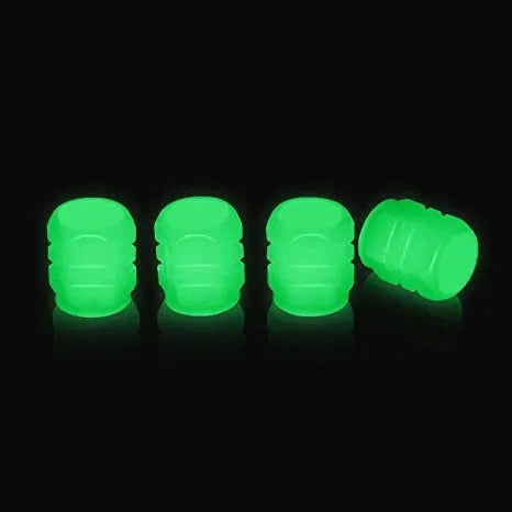 Luminous rubber tyre valve caps with a split design shown in light green, blue, red, yellow, and pink colours.