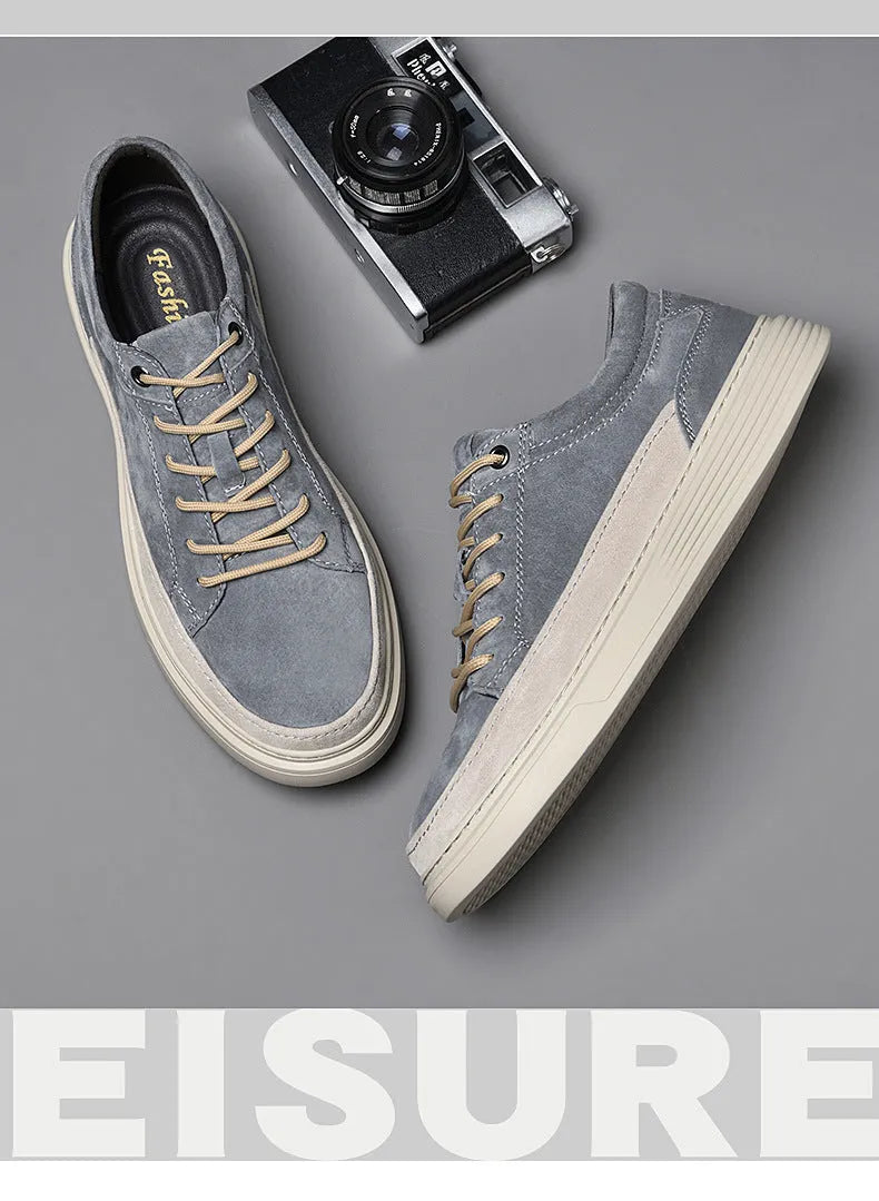 Men's grey casual pigskin skate shoes with rubber sole and round toe design