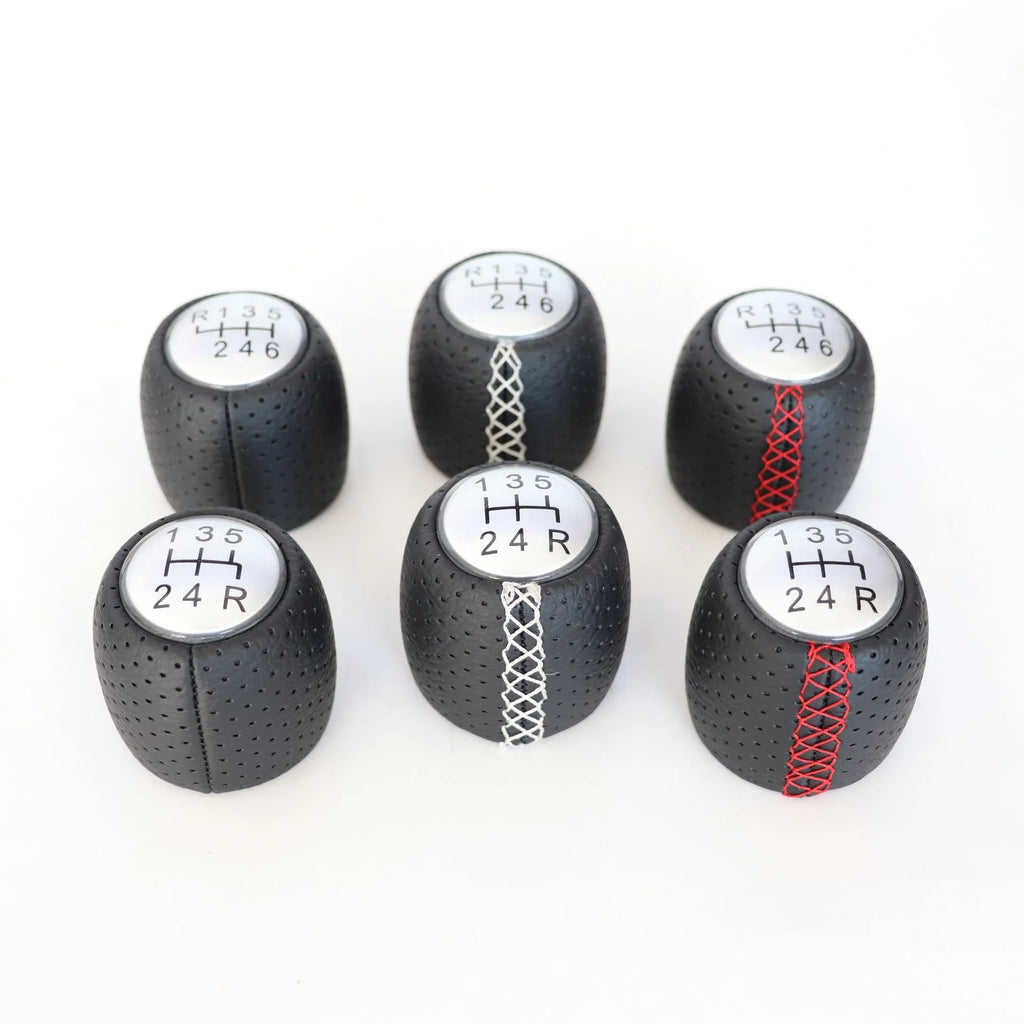 Alpha vehicle leather perforated handball gear in black, red, and white colour options