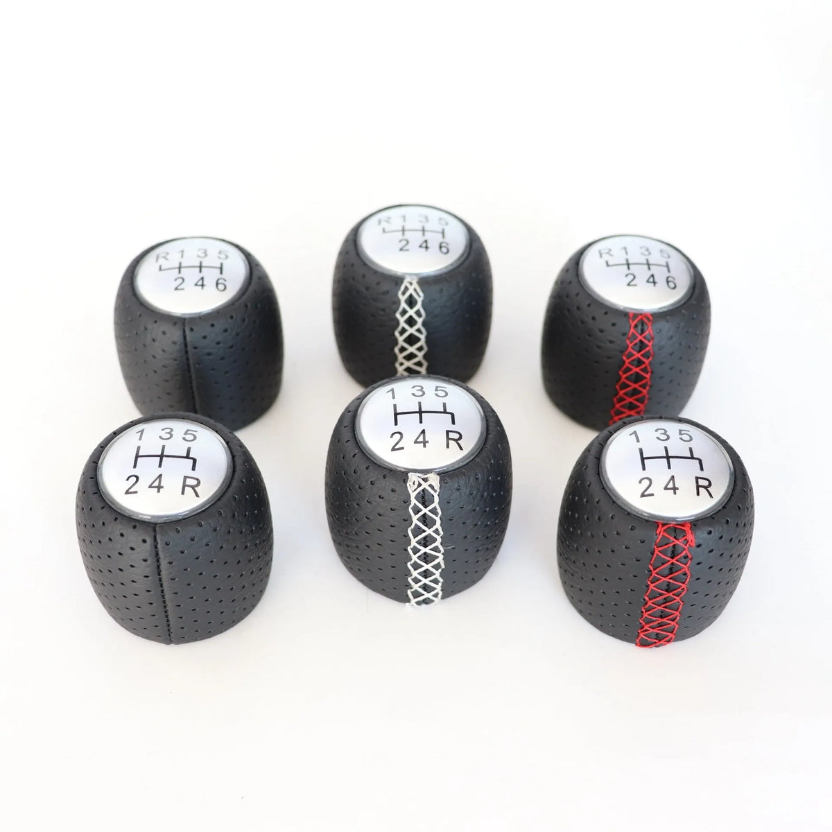 Alpha vehicle leather perforated handball gear in black, red, and white colour options