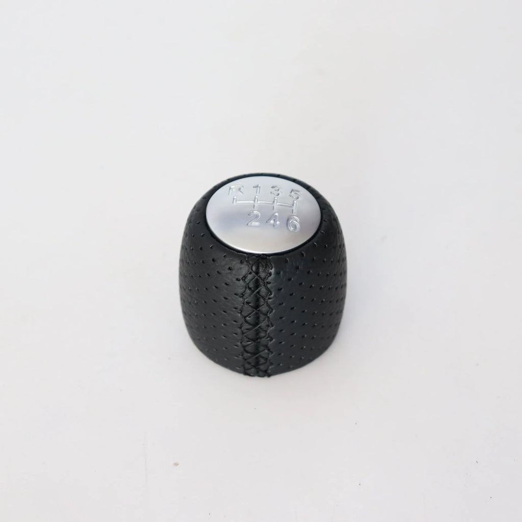 Alpha vehicle leather perforated handball gear in black, red, and white colour options
